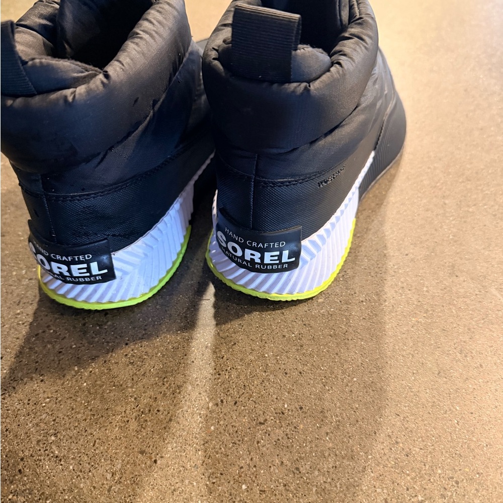 Sorel Women’s Black Booties with White and yellow Highlights